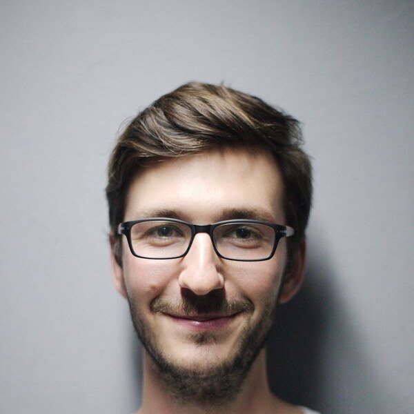 A square portrait photo before circular cropping